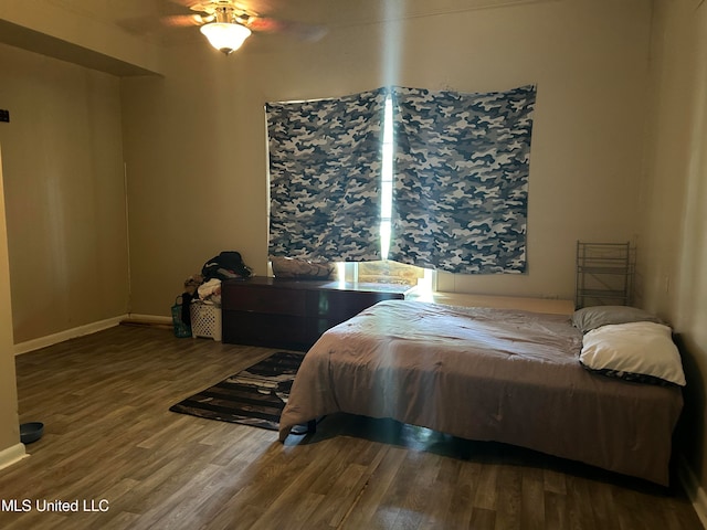 202 Dewey St, Itta Bena, MS 38941 - bedroom featuring hardwood / wood-style flooring and ceiling fan