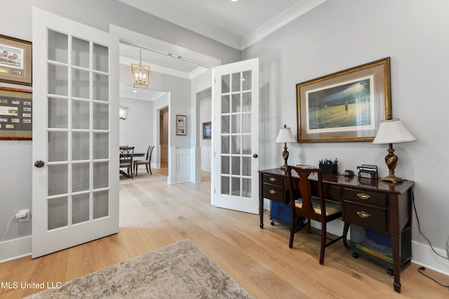 140 Seaside Dr, Ocean Springs, MS 39564 - office space with ornamental molding, wood finished floors, french doors, a chandelier, and a wainscoted wall
