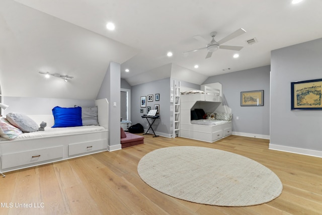 140 Seaside Dr, Ocean Springs, MS 39564 - bedroom featuring lofted ceiling, light wood-type flooring, baseboards, and ceiling fan