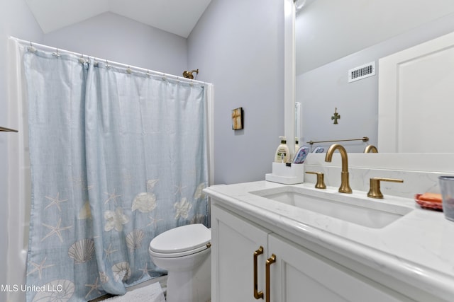 140 Seaside Dr, Ocean Springs, MS 39564 - full bathroom featuring vanity, toilet, lofted ceiling, and curtained shower