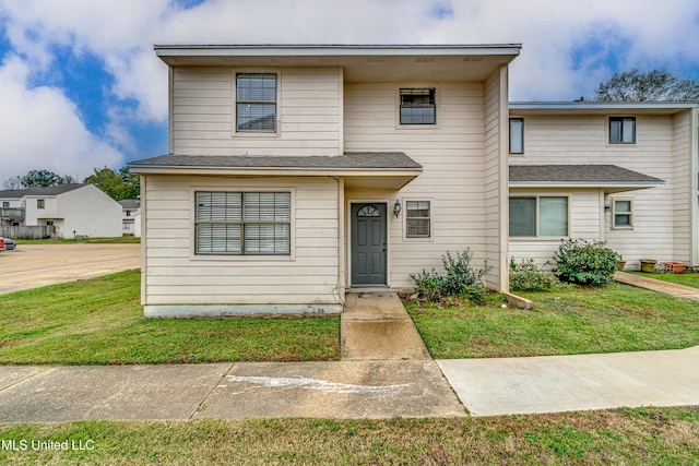 view of front facade with a front lawn