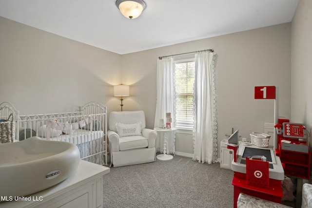 12 Mercer Dr, Petal, MS 39465 - carpeted bedroom with a nursery area and baseboards