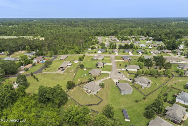 12 Mercer Dr, Petal, MS 39465 - view of property location with a heavily wooded area and nearby suburban area