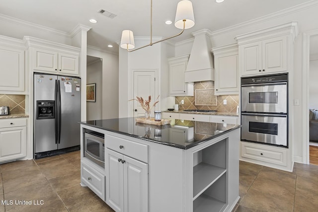 kitchen featuring stainless steel appliances, premium range hood, crown molding, backsplash, and recessed lighting