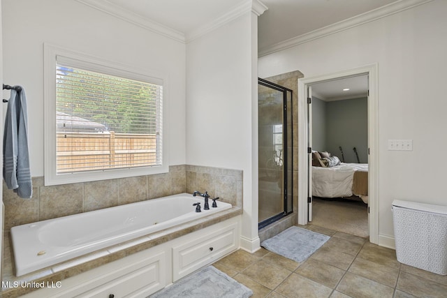 bathroom featuring connected bathroom, a shower stall, ornamental molding, a bath, and tile patterned flooring