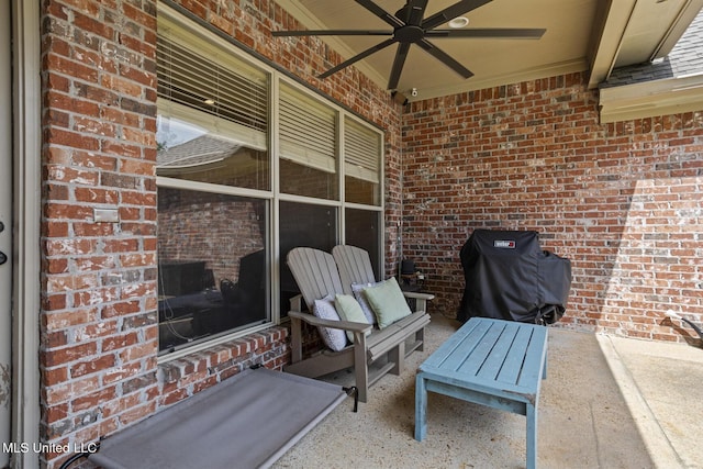 view of patio featuring ceiling fan and a grill