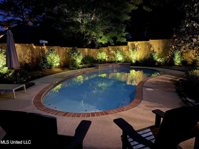 view of pool featuring a fenced backyard and a patio area