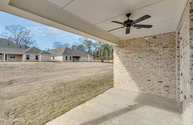 view of patio with ceiling fan