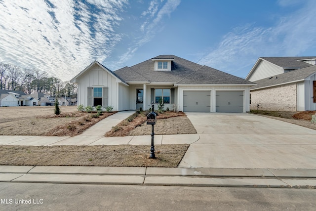 628 Cobalt Way, Brandon, MS 39042 - view of front of house featuring a garage, board and batten siding, driveway, and a shingled roof