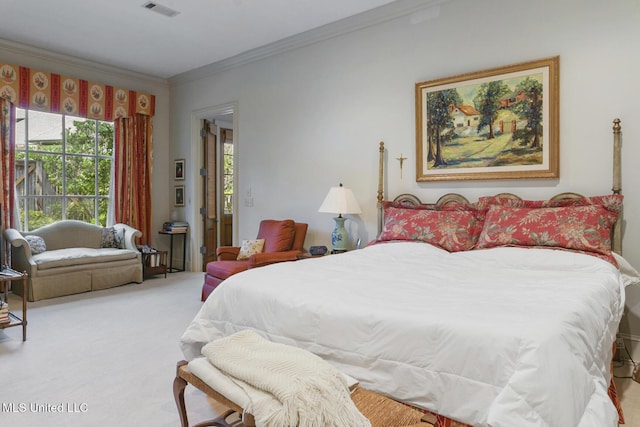 bedroom with light carpet and ornamental molding