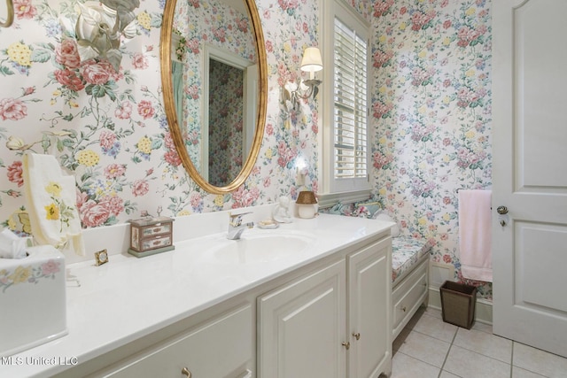 bathroom with tile patterned floors and vanity