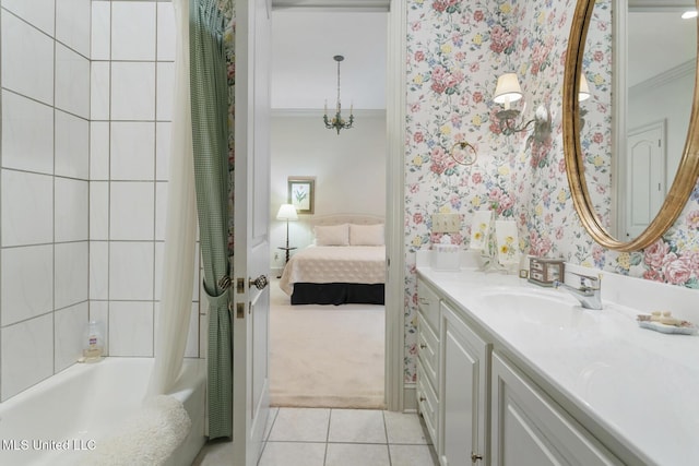 bathroom featuring tile patterned flooring, shower / tub combo, and vanity