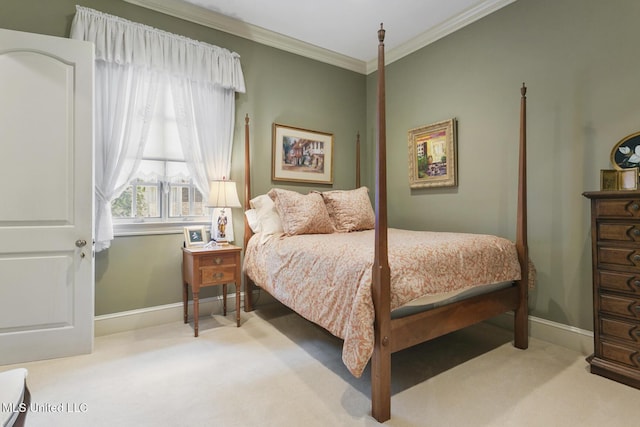 carpeted bedroom with ornamental molding