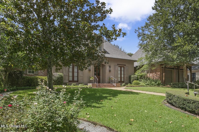 exterior space with a front lawn