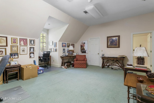 office with vaulted ceiling and carpet flooring