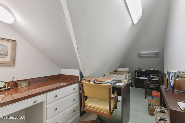 carpeted office space with lofted ceiling