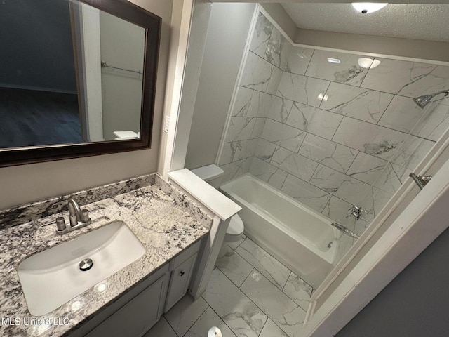 105 Poplar Dr, Brandon, MS 39047 - full bath featuring marble look tile flooring, vanity, bathtub / shower combination, and a textured ceiling