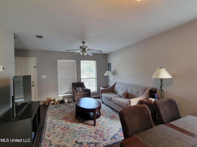 living room featuring ceiling fan