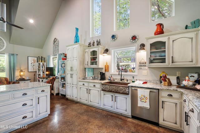 kitchen with stainless steel dishwasher, glass insert cabinets, high vaulted ceiling, finished concrete floors, and a sink