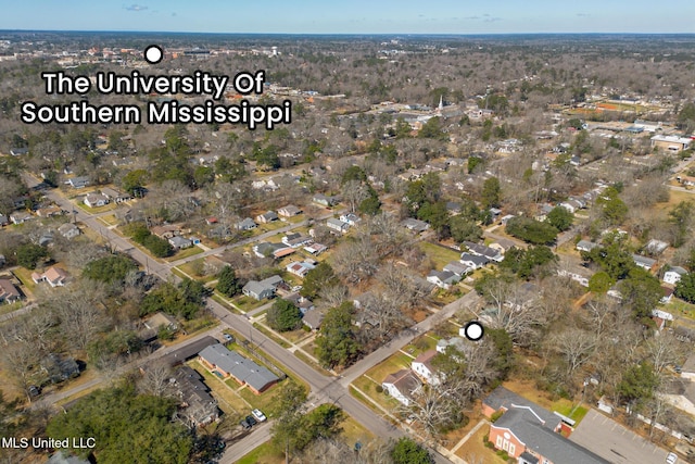 birds eye view of property with a residential view