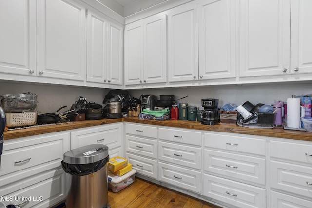 123 Klaas Blvd, Madison, MS 39110 - kitchen featuring butcher block countertops and white cabinetry