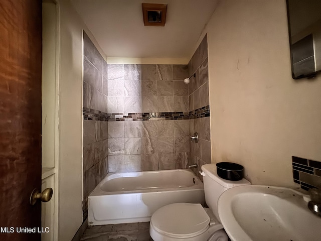 341 Savanna St, Jackson, MS 39212 - bathroom with a sink, bathing tub / shower combination, and toilet