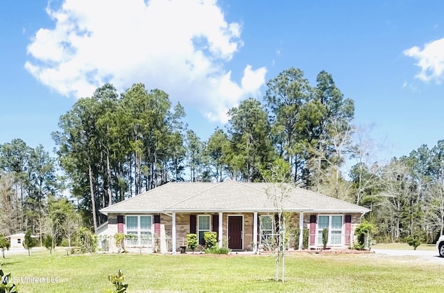 single story home with a front lawn and a porch