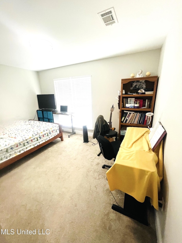 carpeted bedroom with visible vents