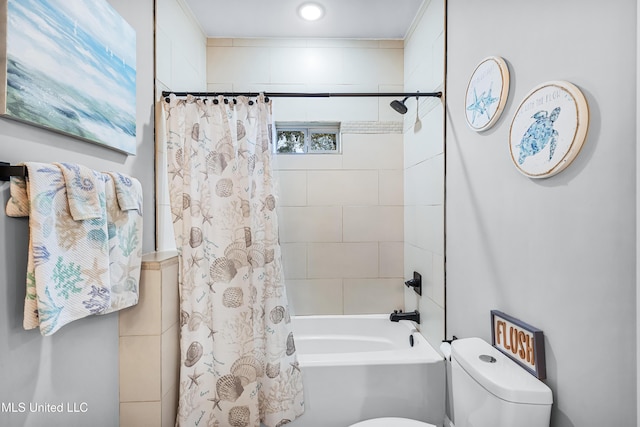 bathroom with shower / tub combo and toilet