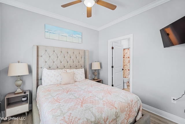 bedroom featuring hardwood / wood-style flooring, ceiling fan, ornamental molding, and ensuite bath