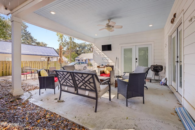 view of patio with french doors, ceiling fan, an outdoor hangout area, and area for grilling