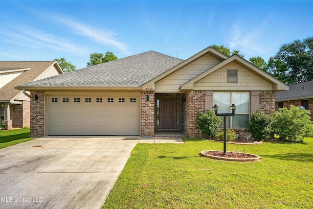 14540 Canal Loop, Gulfport, MS 39503 - single story home featuring a garage, brick siding, concrete driveway, and a front lawn