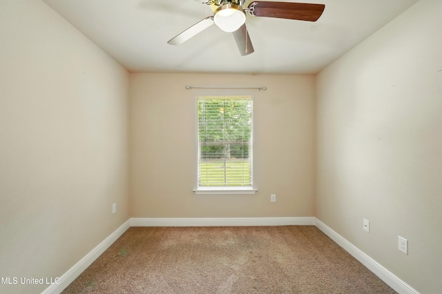 14540 Canal Loop, Gulfport, MS 39503 - spare room featuring carpet, baseboards, and ceiling fan