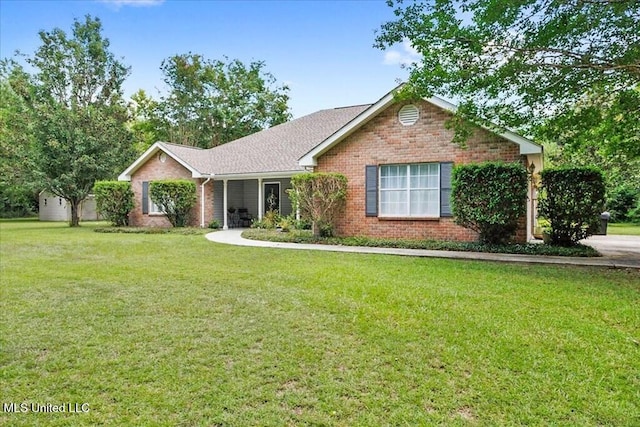 ranch-style house with a front yard