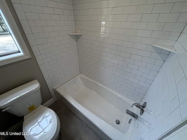 215 Quail Trl, Greenwood, MS 38930 - full bathroom featuring tile patterned flooring, toilet, and shower / washtub combination