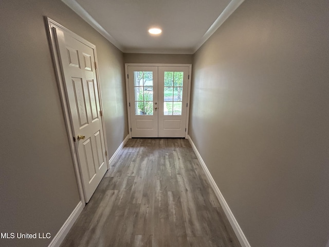 215 Quail Trl, Greenwood, MS 38930 - doorway to outside featuring dark wood-style flooring, baseboards, crown molding, and french doors