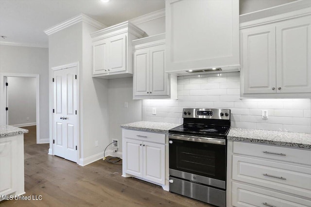 kitchen with white cabinetry, stainless steel electric range, dark wood-type flooring, light stone counters, and ornamental molding