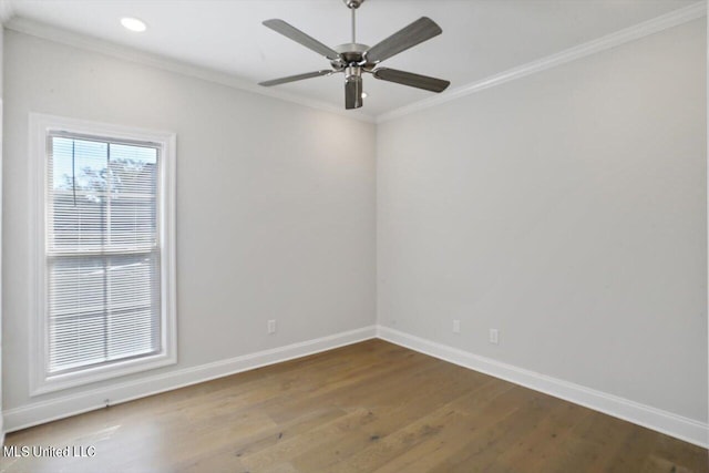 spare room with crown molding, wood-type flooring, and ceiling fan