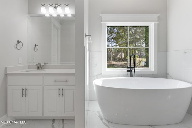 111 Grand Oak Blvd, Clinton, MS 39056 - full bath with marble finish flooring, a soaking tub, and vanity