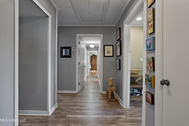 56 53rd St, Gulfport, MS 39507 - hallway featuring attic access, wood finished floors, and ornamental molding