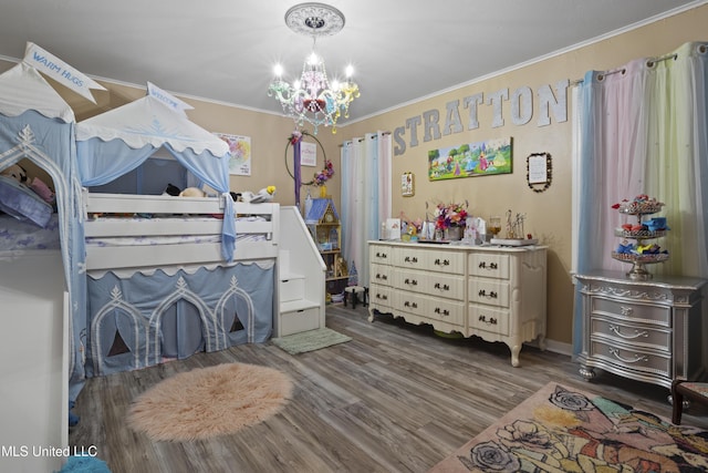 56 53rd St, Gulfport, MS 39507 - bedroom featuring a chandelier, wood finished floors, and ornamental molding
