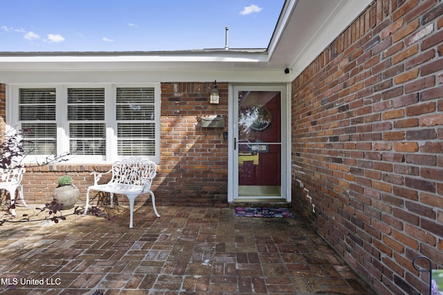 56 53rd St, Gulfport, MS 39507 - entrance to property with brick siding and a patio