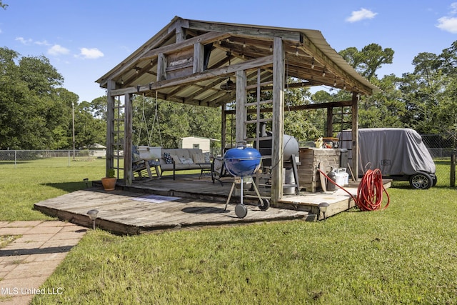 56 53rd St, Gulfport, MS 39507 - wooden terrace featuring a gazebo and outdoor lounge area
