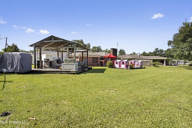 56 53rd St, Gulfport, MS 39507 - view of yard with a gazebo and a wooden deck