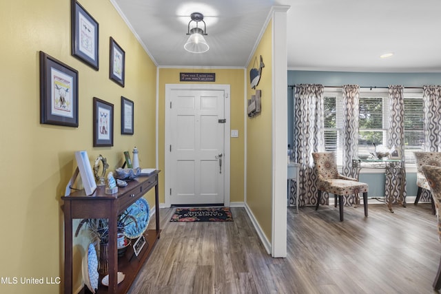 56 53rd St, Gulfport, MS 39507 - foyer featuring crown molding and dark wood-type flooring
