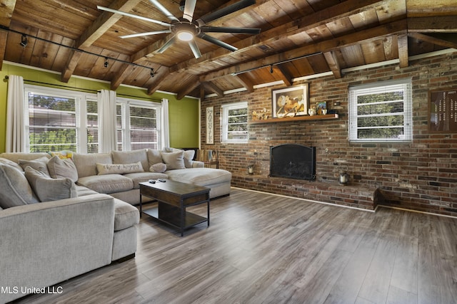 56 53rd St, Gulfport, MS 39507 - living room with wood ceiling, wood finished floors, brick wall, a brick fireplace, and a ceiling fan