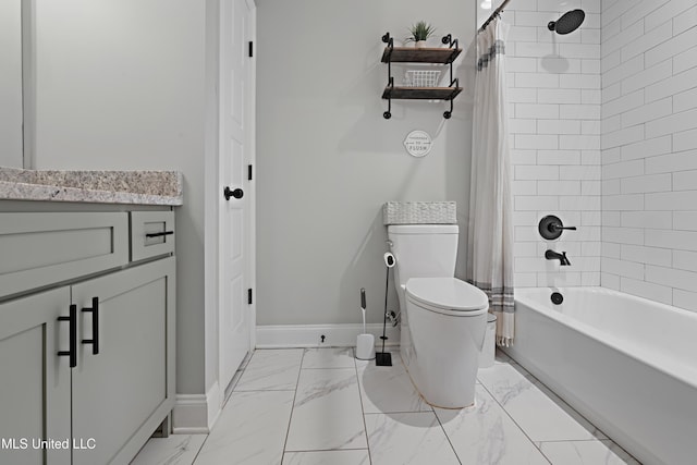 bathroom with marble finish floor, shower / bathtub combination with curtain, toilet, vanity, and baseboards