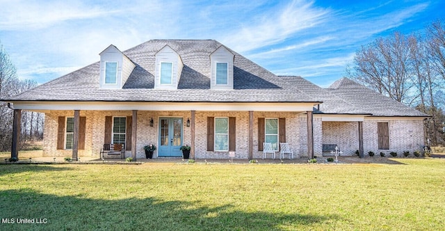 view of front of house featuring a porch, a front lawn, and french doors