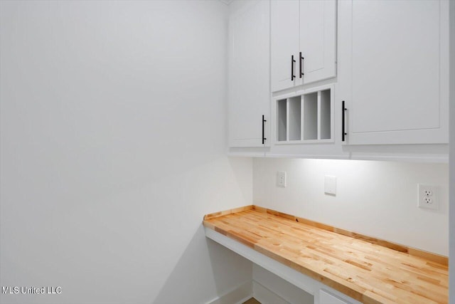420 Lennon Ln, Brandon, MS 39047 - room details featuring baseboards and built in desk
