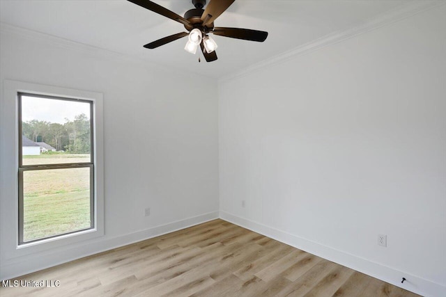 420 Lennon Ln, Brandon, MS 39047 - unfurnished room featuring crown molding, baseboards, ceiling fan, and light wood-type flooring
